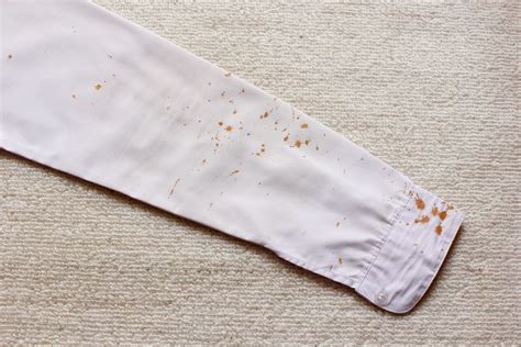 remove tan stain from washable fabric